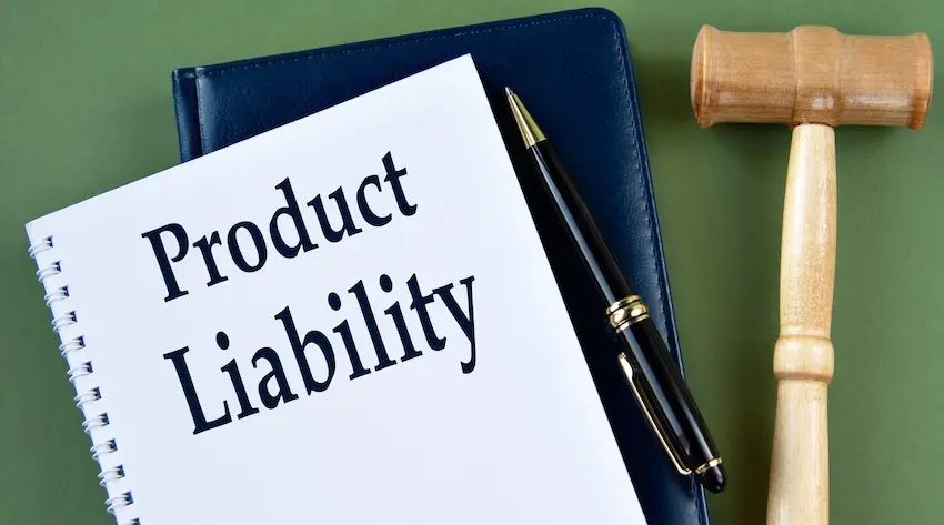 Product liability legal document with a pen and judge's gavel representing product liability injuries lawsuit and compensation claims in South Carolina at McDougall LawFirm LLC.