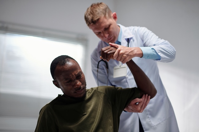 Car accident lawyer reviewing IME documents with client in Beaufort South Carolina