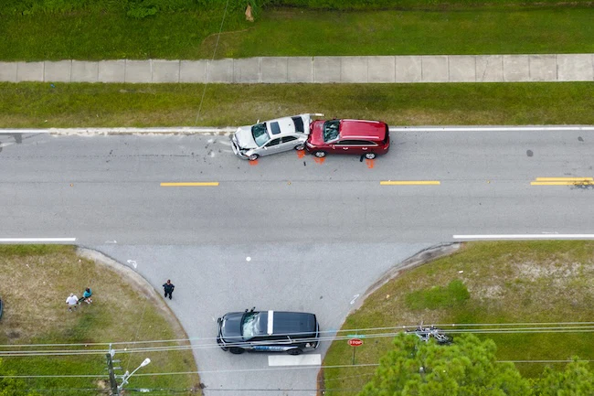 Drone shot of a car crash on the highway