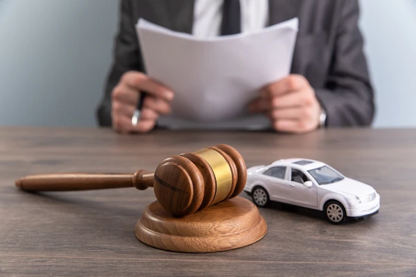 A South Carolina car accident lawyer reviews legal documents.